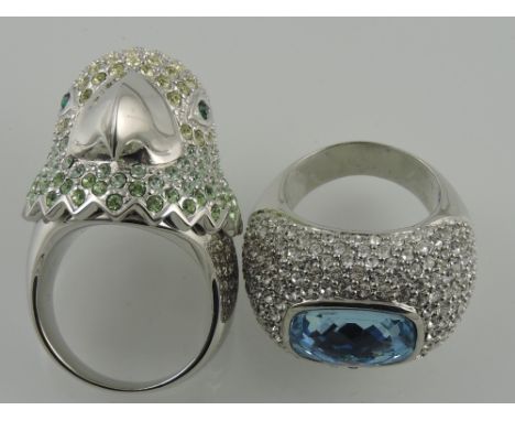 A Noemi Swarovski crystal rodum plated parrot ring, together with a aqua crystal ring, (2).