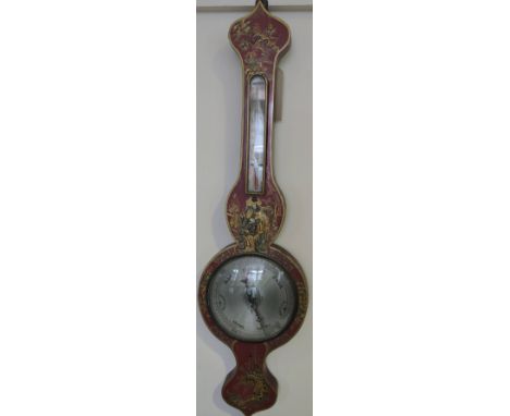 An early 20th Century chinoiserie scarlet lacquer wheel barometer/ thermometer with engraved silvered scales, H. 95 cm. 