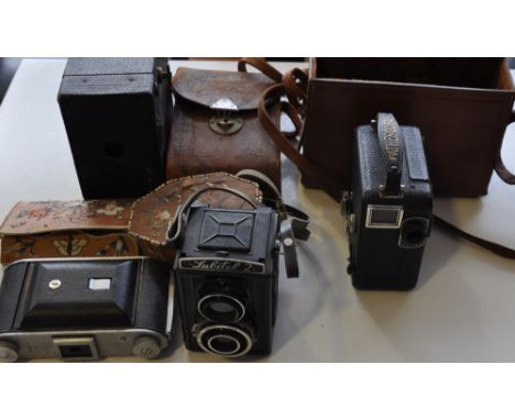 A collection of 9 early 20th Century and later bellows and box cameras, including examples by Ensign, Kodak, together with a 