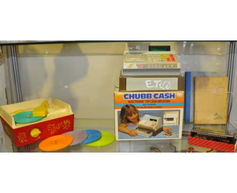 A Fisher Price music box toy record player, together with a toy cash register, 2 children's books and a harmonica