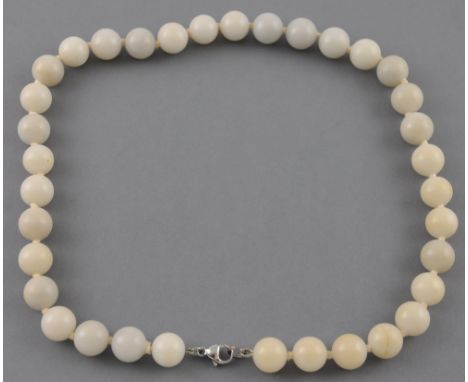 A string of mutton fat jade beads, each bead approx. 6mm diameter, L. 46cm