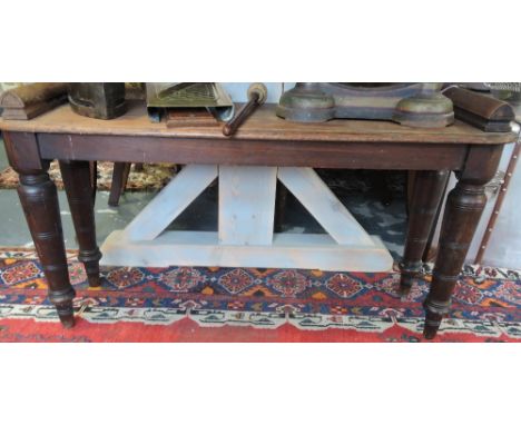 A late Victorian mahogany window seat on ring turned tapered legs, L. 90 cms