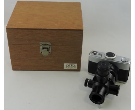 An Olympus PM6 scientific magnification Camera serial no. 232431, circa 1960 in original teak box