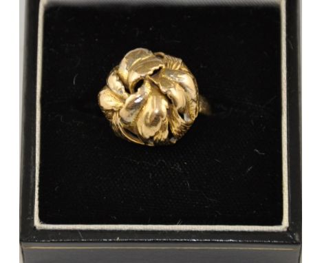 A gold dress ring, of cluster leaf form and marked as 9ct, 5.5g.