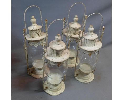 A set of four storm lantern 