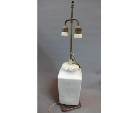 An early 20th century Chinese ceramic lamp, decorated with character marks 