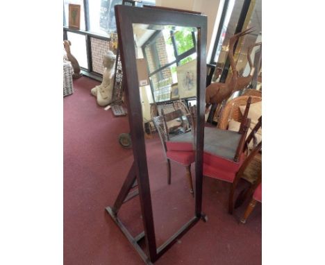 A Contemporary stained teak floor standing mirror, having bevelled glass plate, on easel support, H.147 W.62cm 