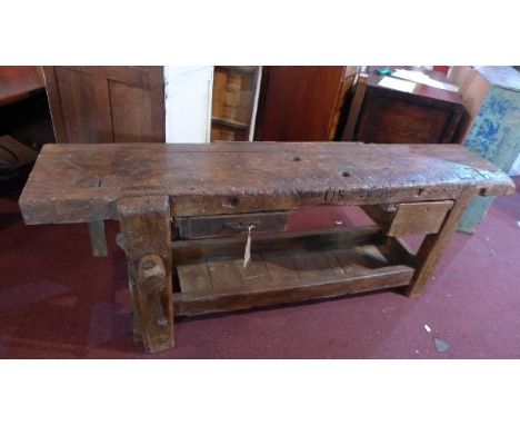 A late 19th century elm work bench, H.73 W.205 D.45cm 