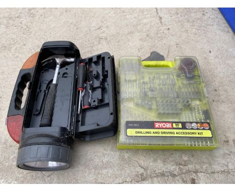 A RYOBI DRILLING AND DRIVING ACCESSORY KIT AND A TORCH ENCLOSING A TOOL BOX SECTION 