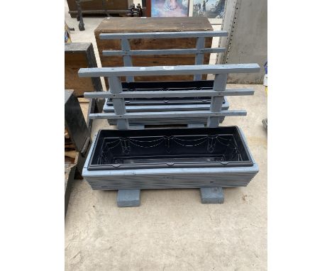 A PAIR OF WOODEN TROUGH PLANTERS 