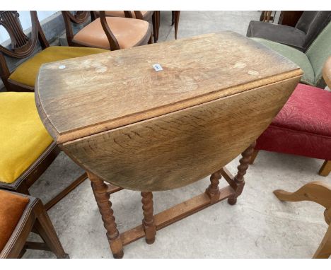 A LIGHT OAK EARLY 20TH CENTURY BARLEYTWIST GATELEG DINING TABLE 