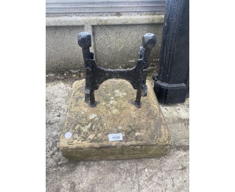 A VINTAGE BOOT SCRAPPER WITH STONE BASE 
