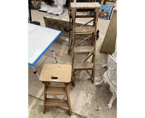 A TWO RUNG WOODEN STEP LADDER AND A FURTHER THREE RUNG VINTAGE WOODEN STEP LADDER 