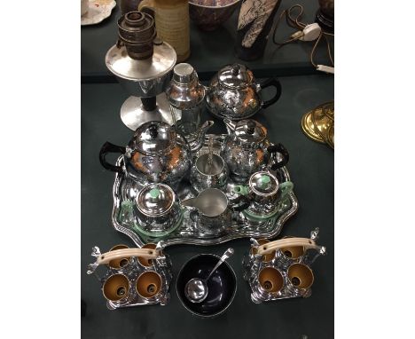 A SELECTION OF CHROME ITEMS TO INCLUDE A TEA SET, EGG CUPS AND A COCKTAIL SHAKER 