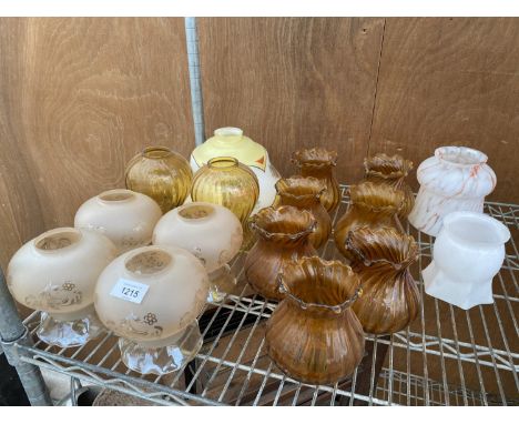 A LARGE COLLECTION OF RETRO GLASS LIGHT SHADES 