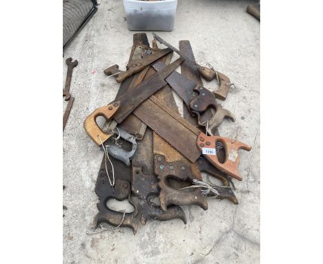 A QUANTITY OF VINTAGE WOODEN HANDLED SAWS 