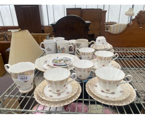 NINETEEN PIECES OF BOWBELL VINTAGE TEA WARE 'PINK ROSE' TO INCLUDE SIX TRIOS, A 1910 JUBILEE SOUVENIR PLATE FOR THE CO-OPERAT