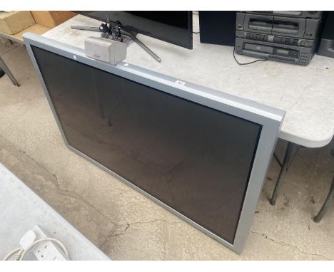 A 61" NEC TELEVISION WITH A HITATCHI SPEAKER 