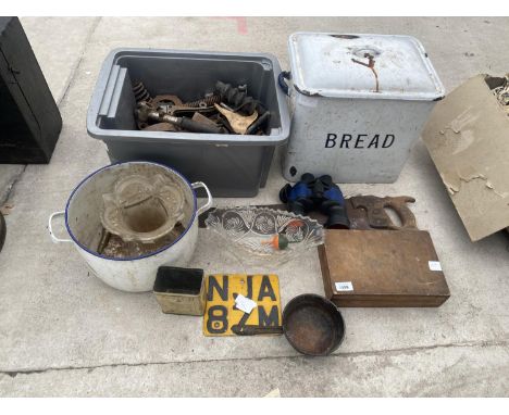 AN ASSORTMENT OF ITEMS TO INCLUDE VINTAGE CAR PARTS, AN ENAMEL BREAD BIN AND A VINTAGE HAND SAW ETC 