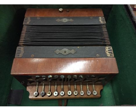 A VINTAGE BUTTON ACCORDIAN WITH CASE 