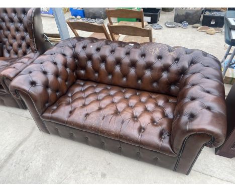 A BROWN BUTTON BACK CHESTERFIELD SETTEE 