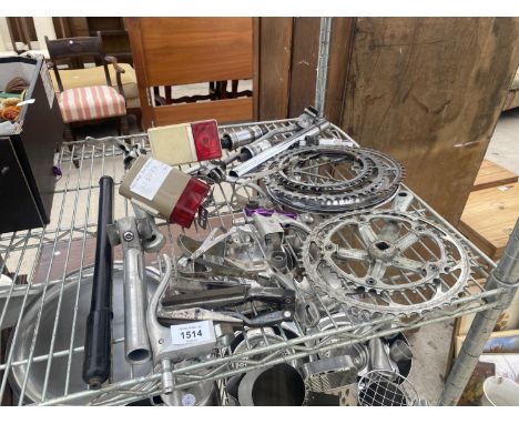 AN ASSORTMENT OF VINTAGE BICYCLE PARTS TO INCLUDE SHIMANO AND CAMPAGNOLO 