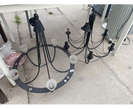 A PAIR OF DECORATIVE BLACK METAL CIELING LIGHT FITTINGS 