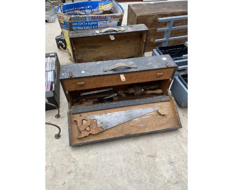 A PAIR OF VINTAGE WOODEN JOINERS CHESTS WITH AN ASSORTMENT OF TOOLS TO INCLUDE SAWS, CHISELS AND SPIRIT LEVELS ETC 