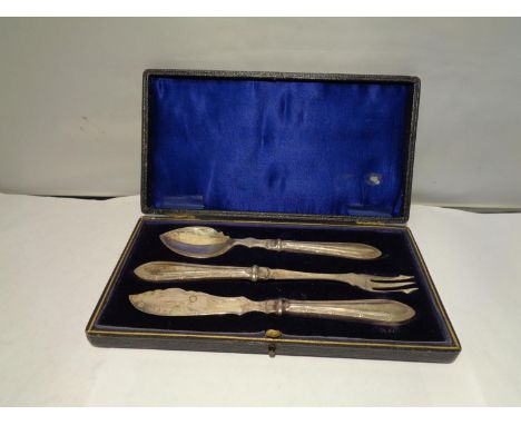 A BOXED SILVER HANDLED THREE PIECE FLATWARE SET 