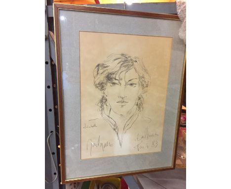 A SIGNED SKETCH OF A WOMANS HEAD AND SHOULDERS 