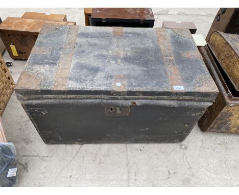 A VINTAGE WOODEN STORAGE CHEST WITH METAL BANDING 