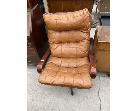 A MODERN FAUX LEATHER BUTTON BACK EASY CHAIR 