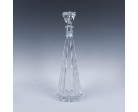 Elegant clear facetted crystal with a tall elongated shape that create an eye catching reflection of light. Unmarked. Issued: