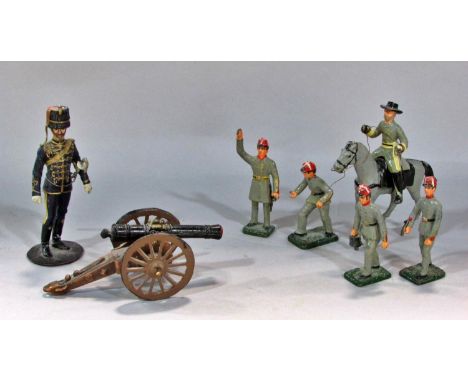 An American Confederate Army lead four man gun crew, a canon and an Officer on horseback together with a single 19th century 