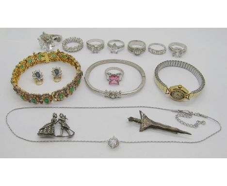 Collection of jewellery to include a 9ct white gold three stone gem dress ring, maker 'DOM', Birmingham, a Longines 9ct lady'