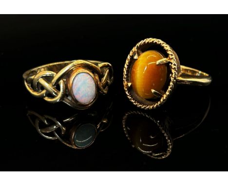 Clogau 9ct opal ring, size O, 2.2g and a 10k cabochon tigers eye ring, size L, 3.4g 