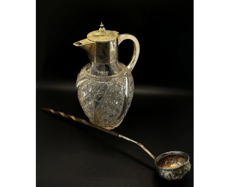 A late 19th century cut glass wine jug with silver collar, spout and handle, Sheffield 1896, maker Goldsmiths a&amp; Silversm