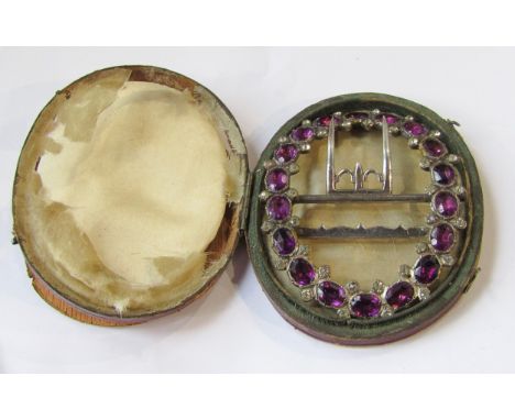 Georgian silver amethyst coloured paste buckle (one paste loose but present), with an associated period case with inscription