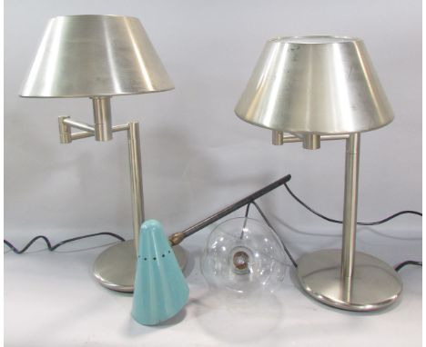 A pair of contemporary brushed steel bedside lamps with hinged extendable arm and brushed steel shade together with a retro c