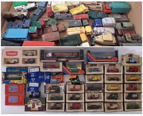 A collection of boxed model vehicles including an Eddie Stobart lorry by Corgi 59504, vintage coach and double decker bus by 