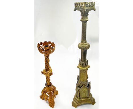 A 19th century ecclesiastical brass pricket candlestick of Puginesque form, with pierced hexagonal cradle, raised on an archi