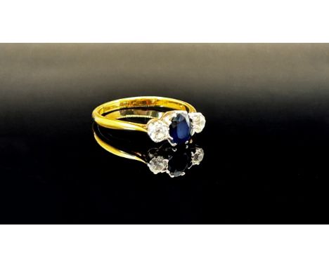 Early 20th century 18ct sapphire and diamond three stone ring with platinum setting, size N, 2.3g 