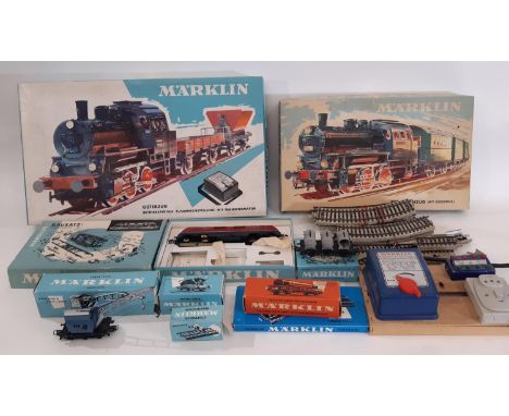 A collection of HO gauge Marklin train sets and models including boxed sets 2967 and 3100, boxed rolling stock, a kit built l