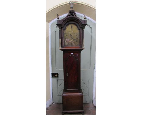 A Georgian mahogany longcase clock the pagoda hood with column supports, pierced fret and eagle finials, the broken arch bras