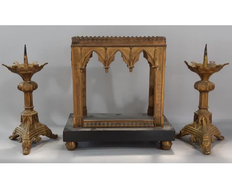 A 19th century ecclesiastical gilt brass reliquary casket, of architectural form in the Puginesque style with lancet arches f