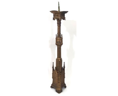 A tall and impressive 19th century gothic ecclesiastical brass pricket candlestick, of Puginesque architectural form, 87cm hi