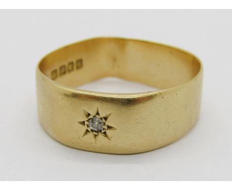 18ct ring set with a diamond within star-cut surround, London 1922, size R, 5g (misshapen) 