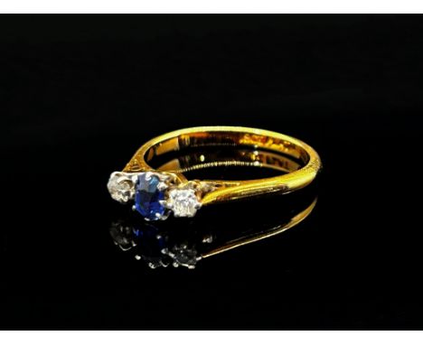 Early 20th century 18ct claw set sapphire and diamond three stone ring with platinum setting, size P, 3.1g 