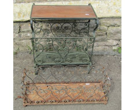 Iron Canterbury and a planter both with scrolled detail 