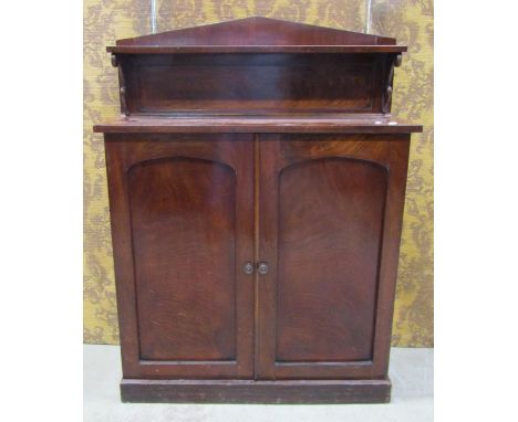 Mid 19th century mahogany veneer chiffonier enclosed by two panelled doors beneath a raised back, 90cm wide 
